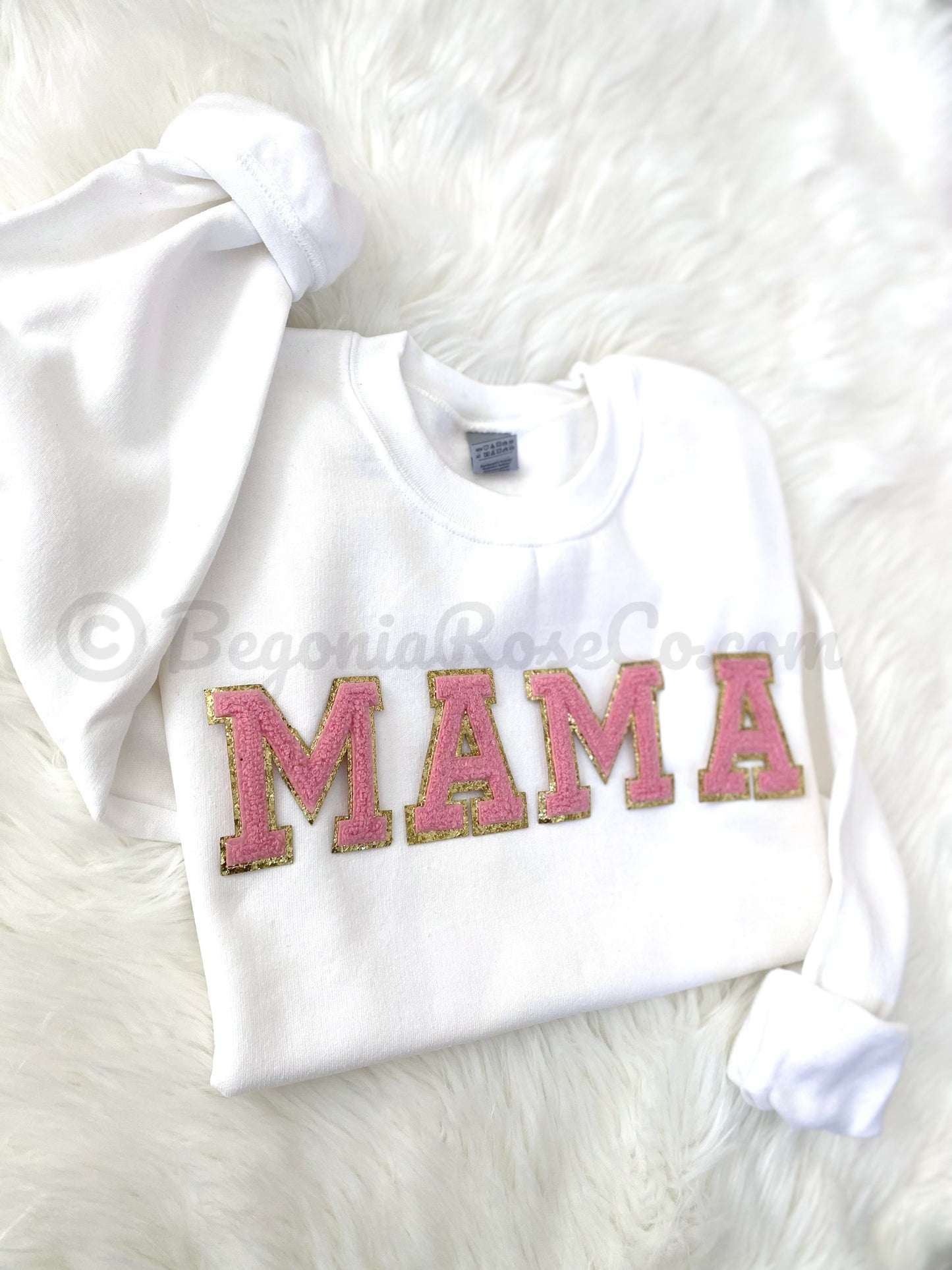 White crewneck sweatshirt with pink and gold chenille MAMA patch