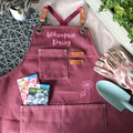Canvas gardening apron with pocket worn for garden and greenhouse work