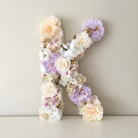 Large custom floral initial event photography prop on wood base