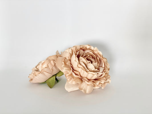 Taupe artificial ranunculus top view for neutral wedding decor