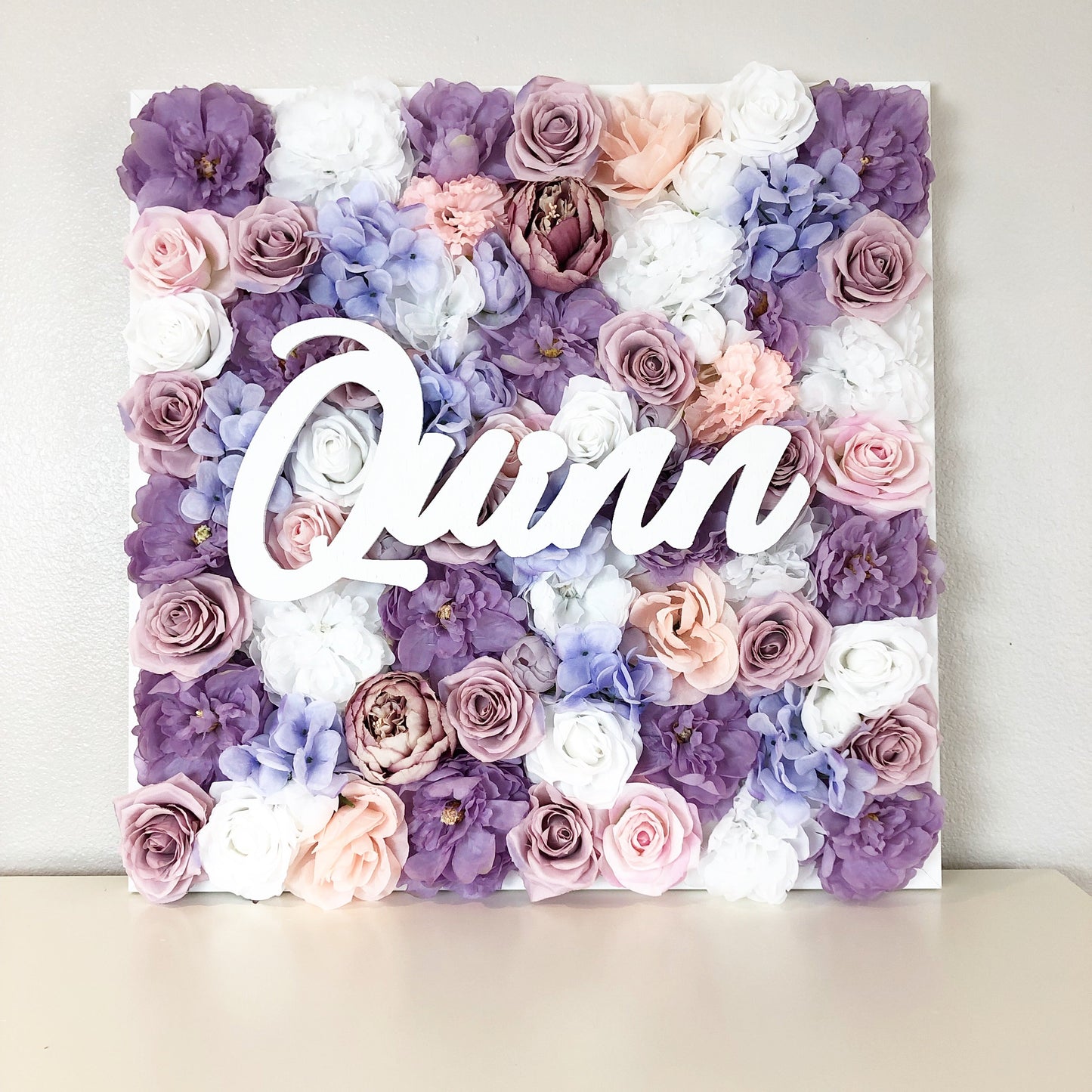 Blush silk flower wall name sign master bedroom decor