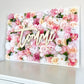 Silk flower wall backdrop with custom wood name sign wedding