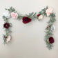 Burgundy blush wedding garland reception