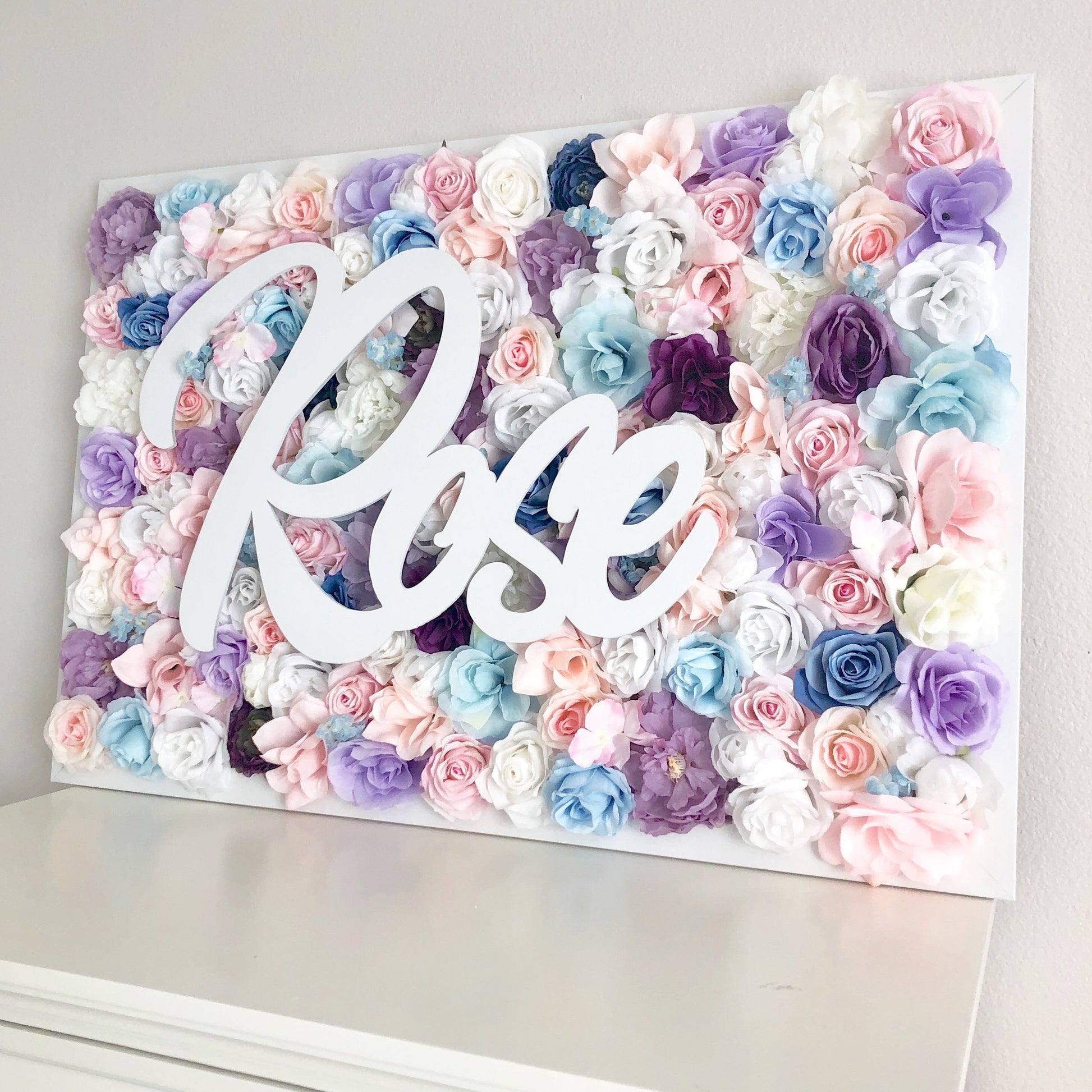 Luxe flower wall with name sign personalized decor