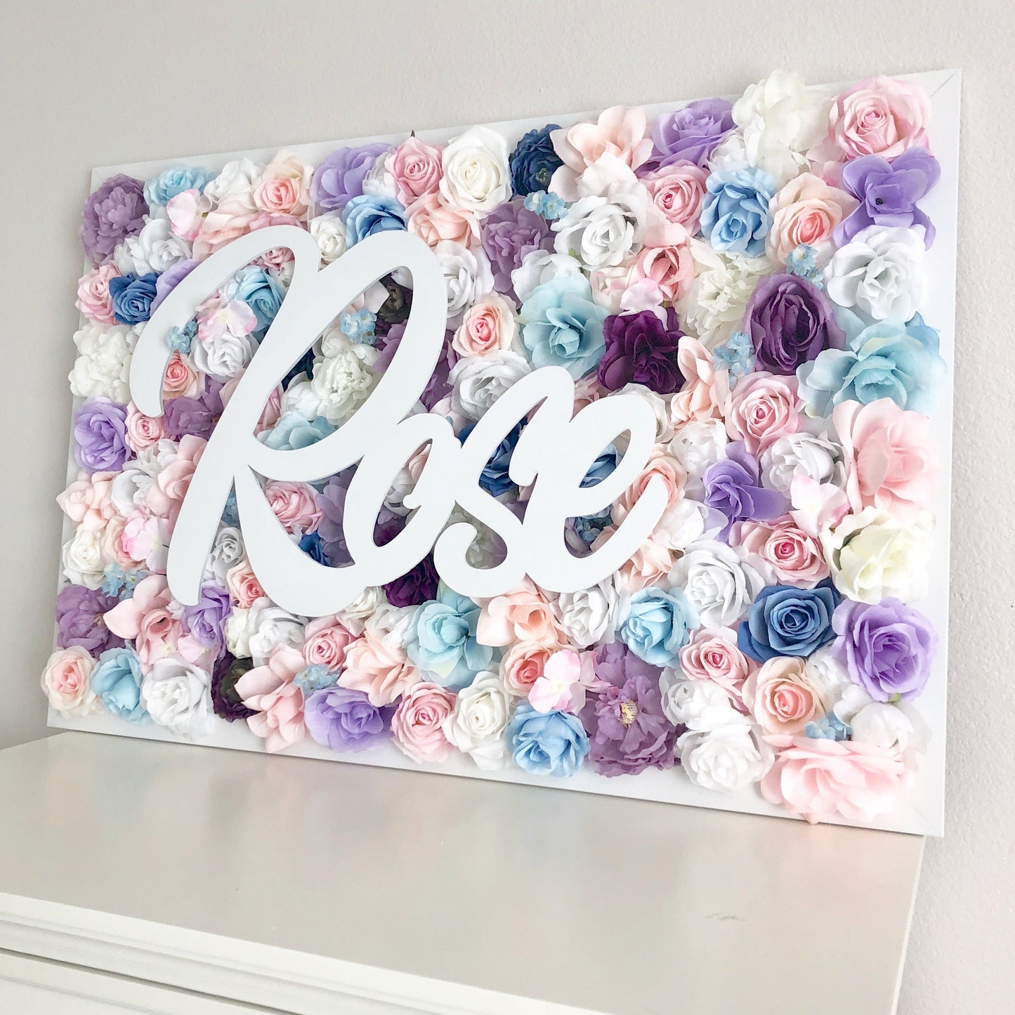 Luxe flower wall with name sign personalized decor