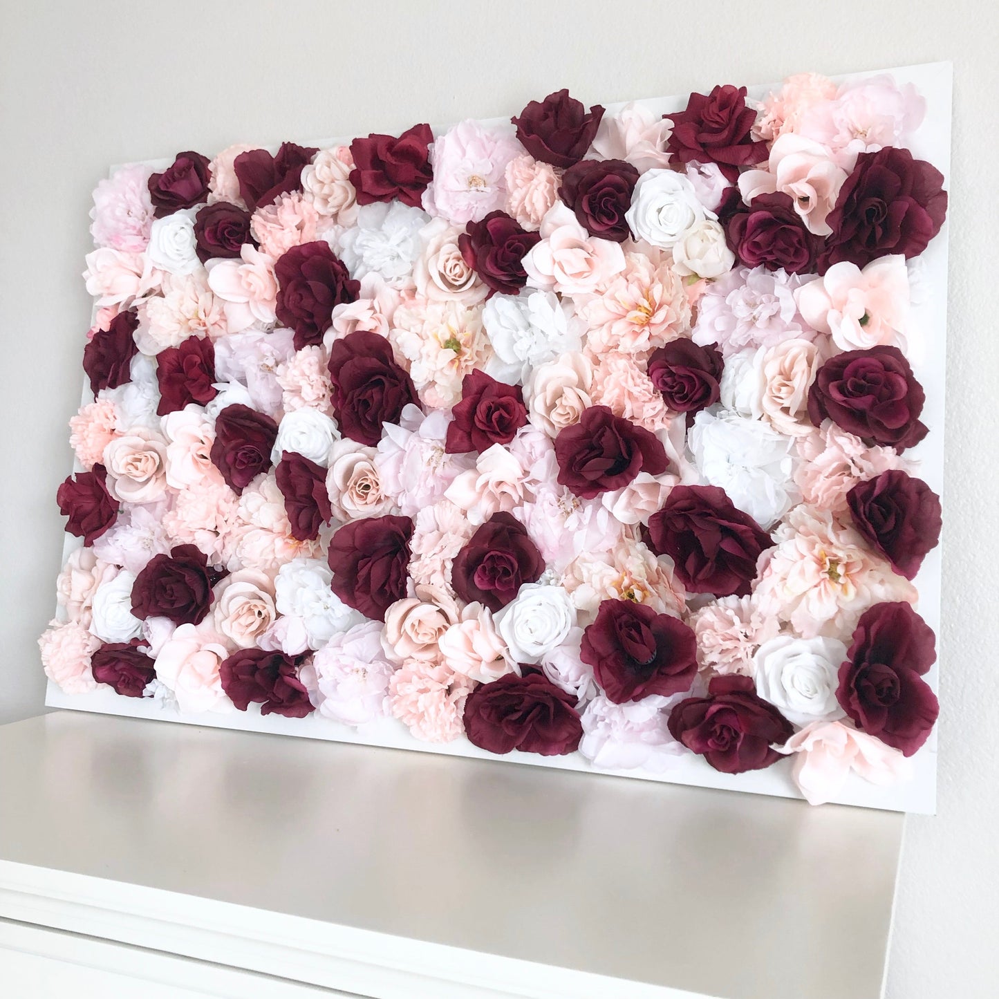 Burgundy blush flower wall wedding