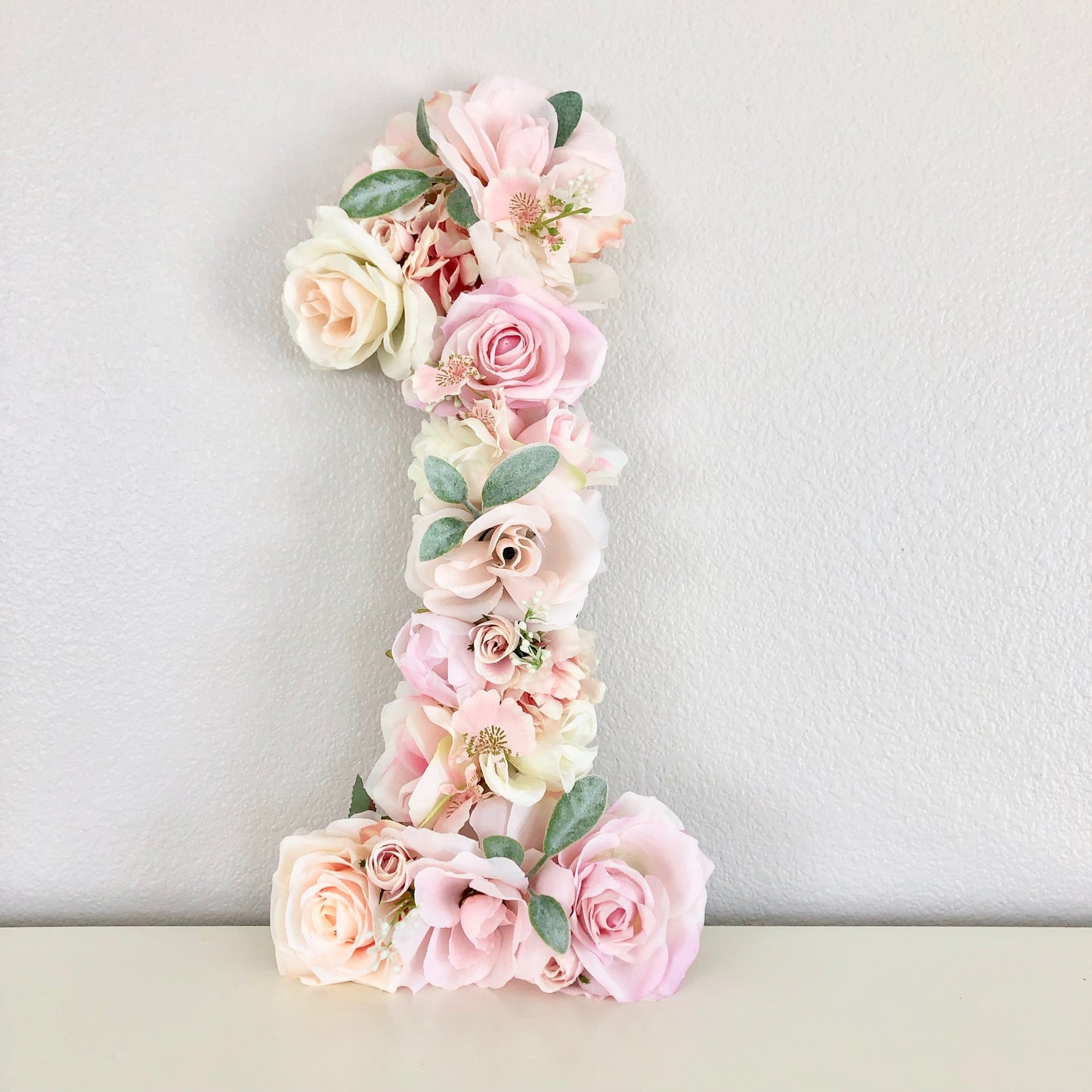 Floral number one faux flower first birthday photo