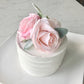 Floral birthday decor cake table arrangement
