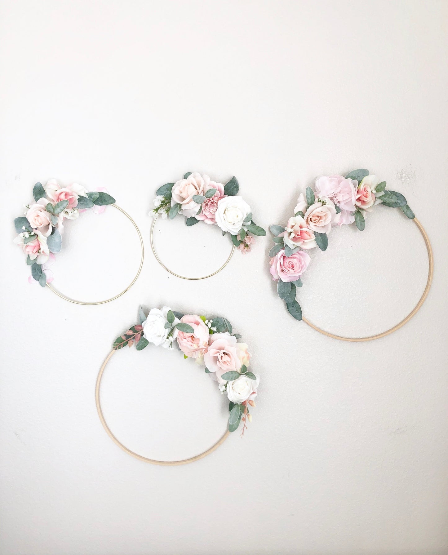 Floral hoop wall hanging with custom text for baby room