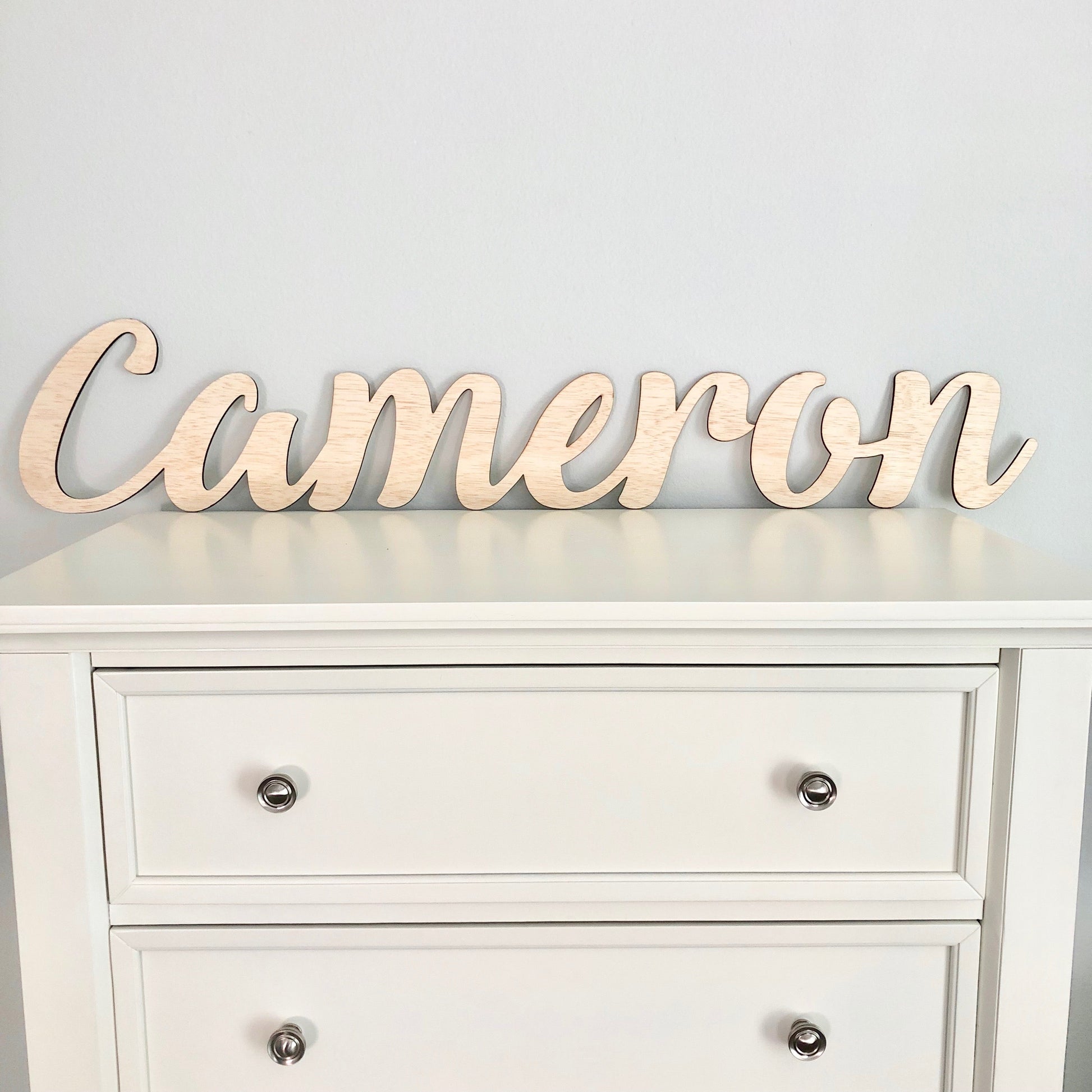Gender neutral wood name sign