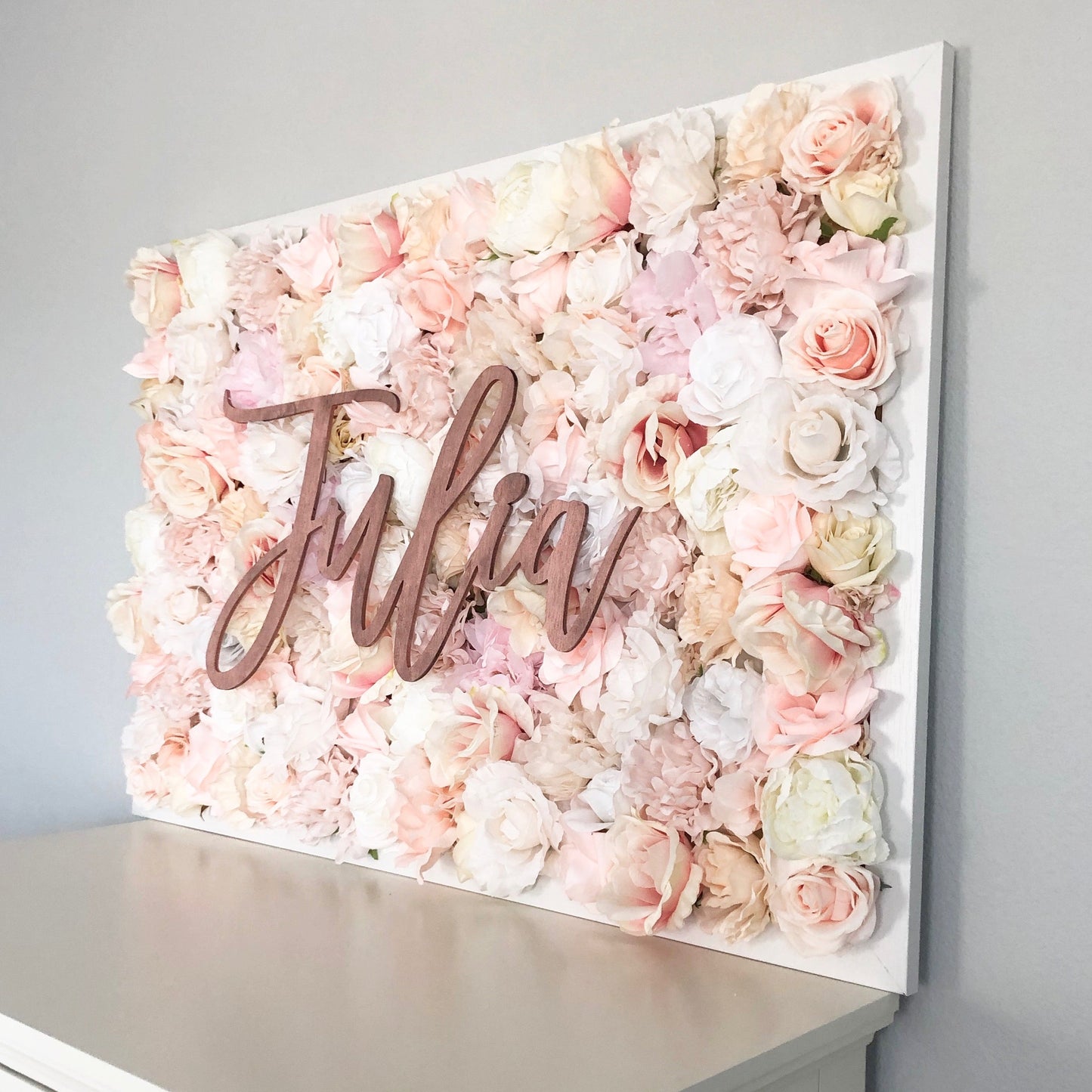Flower wall with name sign birthday party backdrop floral display