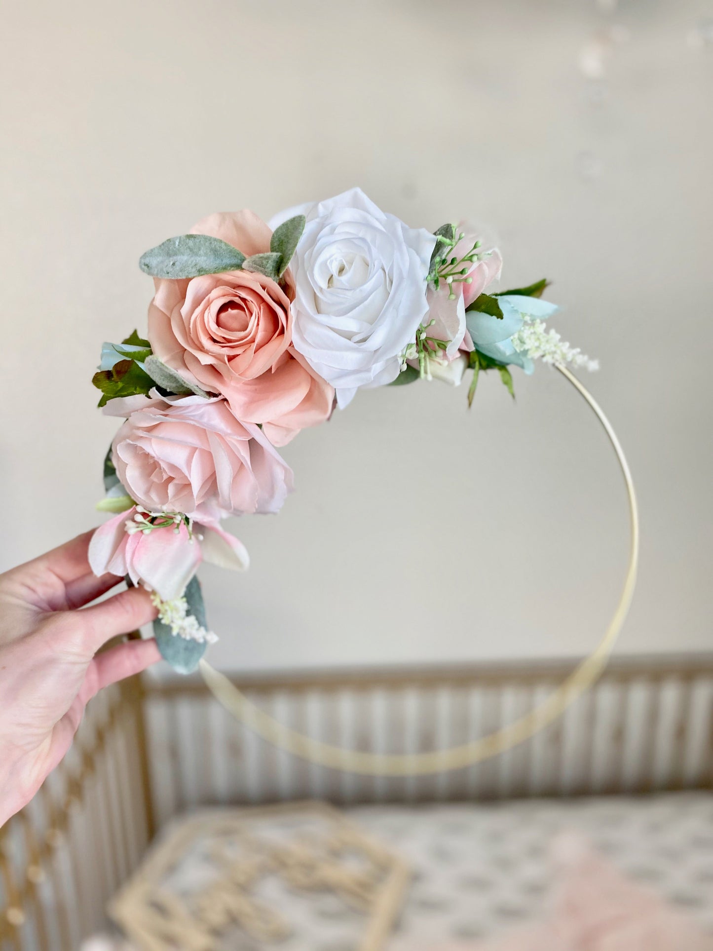 Decorative floral hoop wreath personalized with baby name