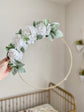 Hand-assembled floral hoop wreath with custom baby name