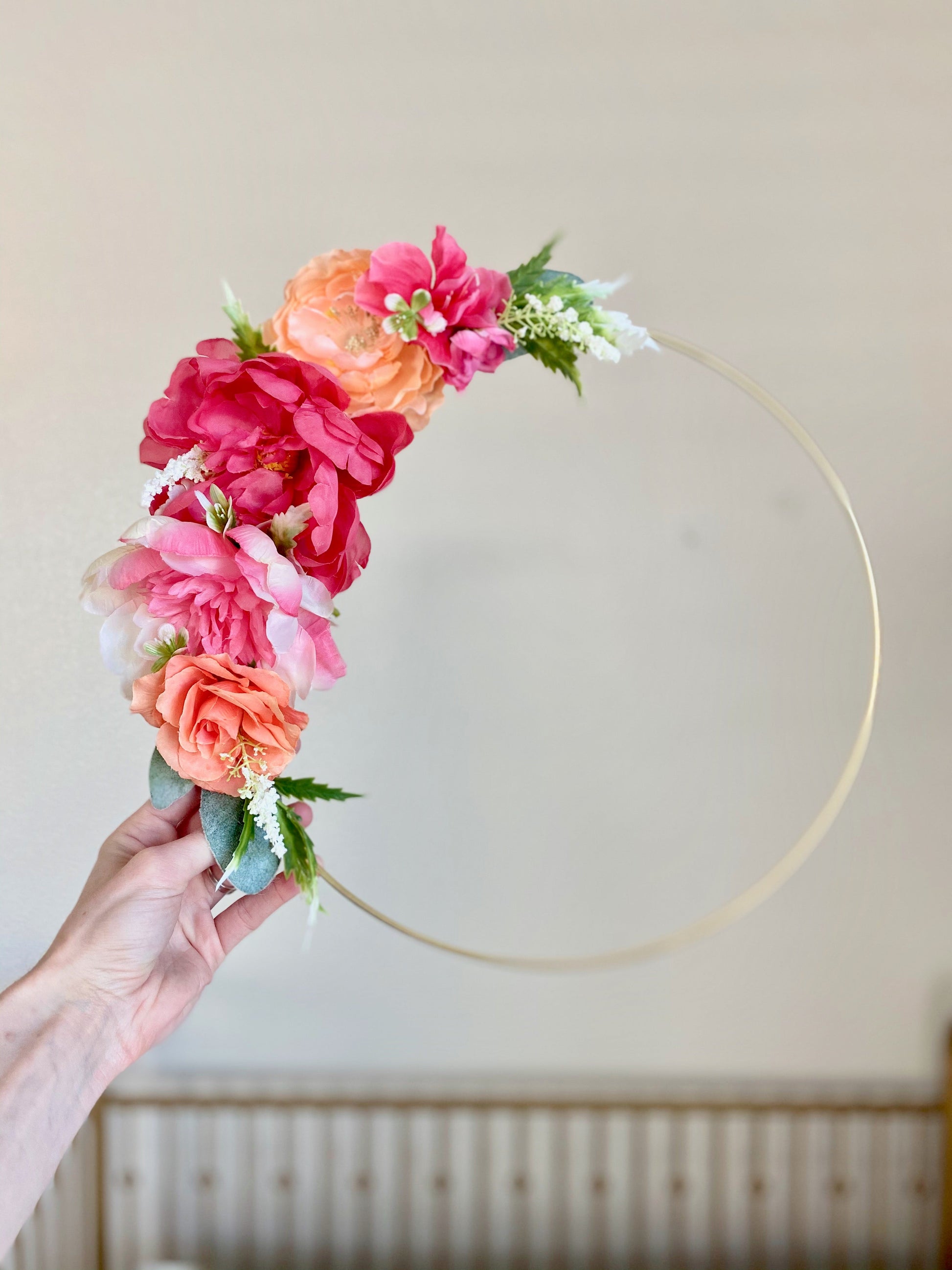 Custom floral hoop arrangement personalized for baby nursery