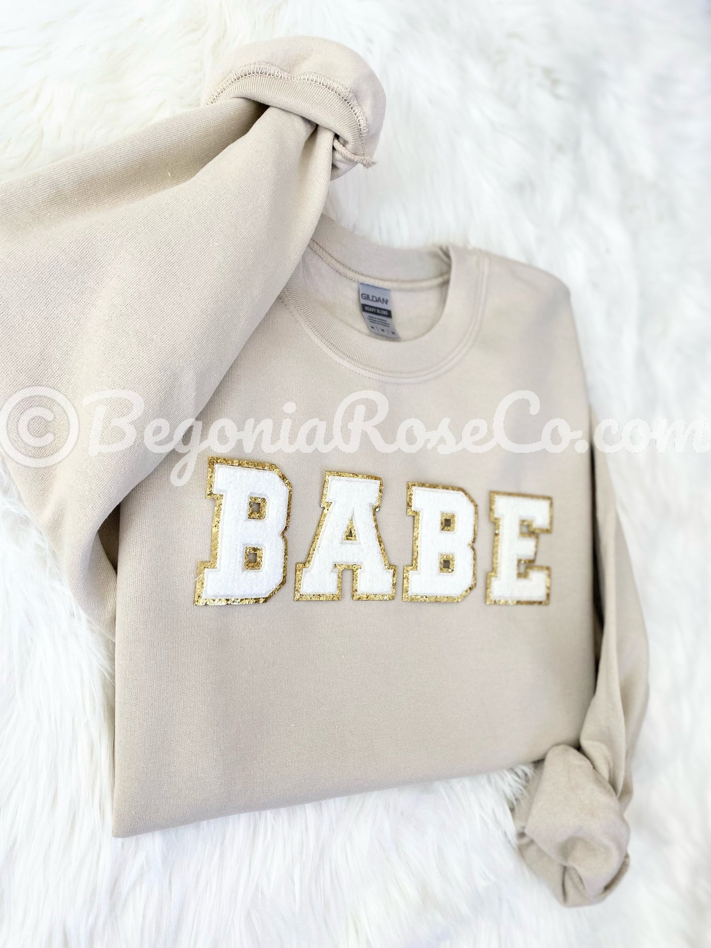 BABE patch sweatshirt front view showing elastic cuffs and waistband detail
