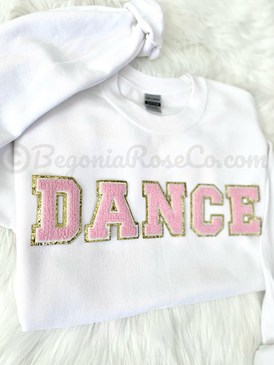 DANCE patch sweatshirt flat lay in white with light pink chenille letters