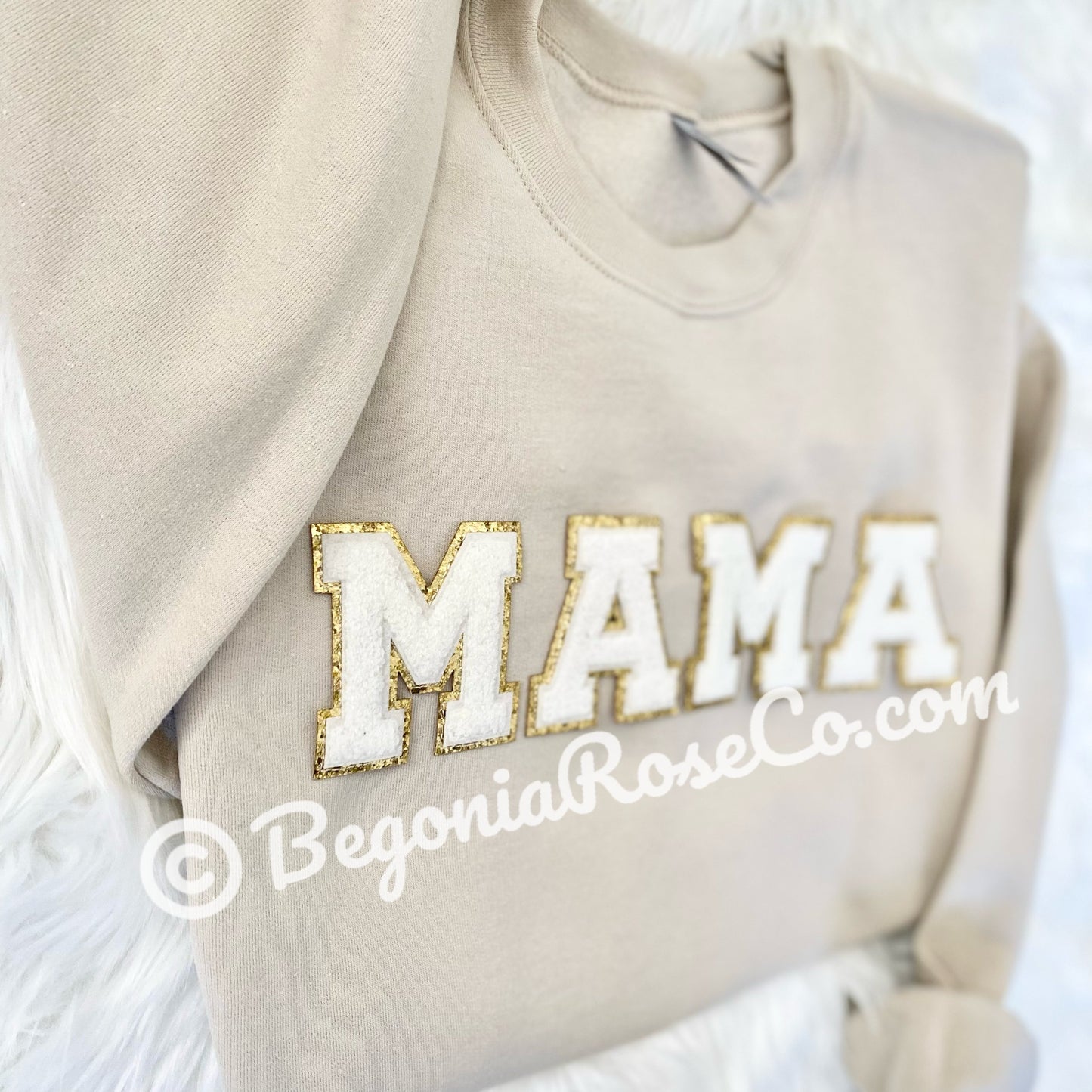 Chenille letter patches in pink on white textured background