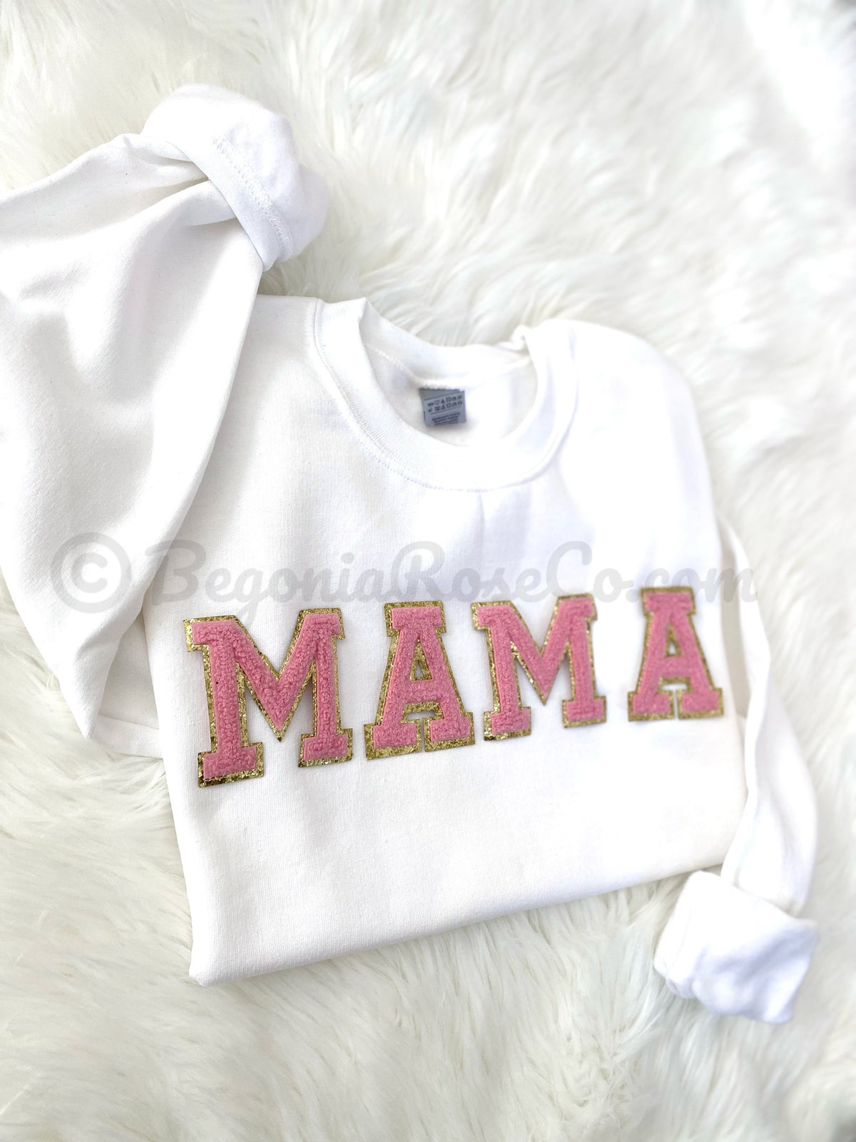 White crewneck sweatshirt with pink and gold chenille MAMA patch