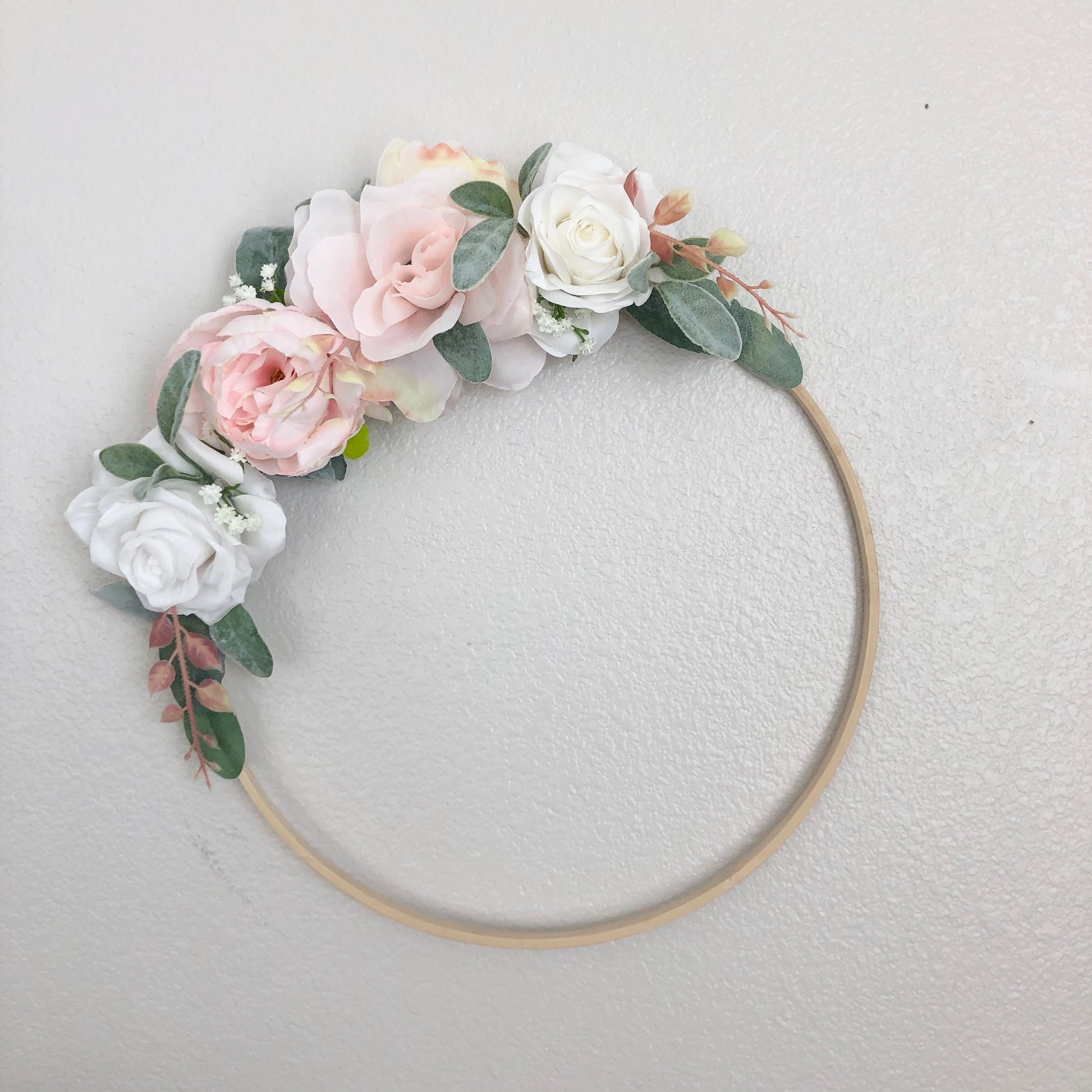 Floral hoop nursery sign with custom baby name personalization