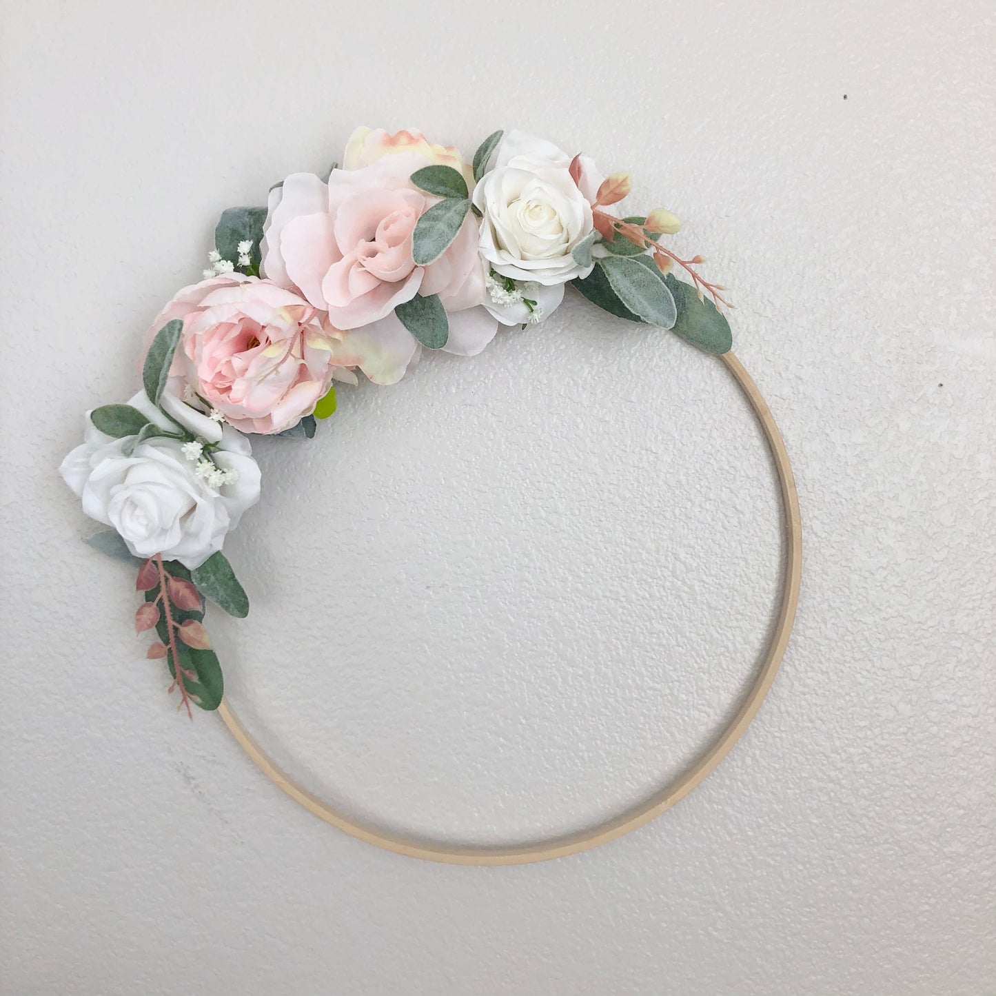 Floral hoop nursery sign with custom baby name personalization