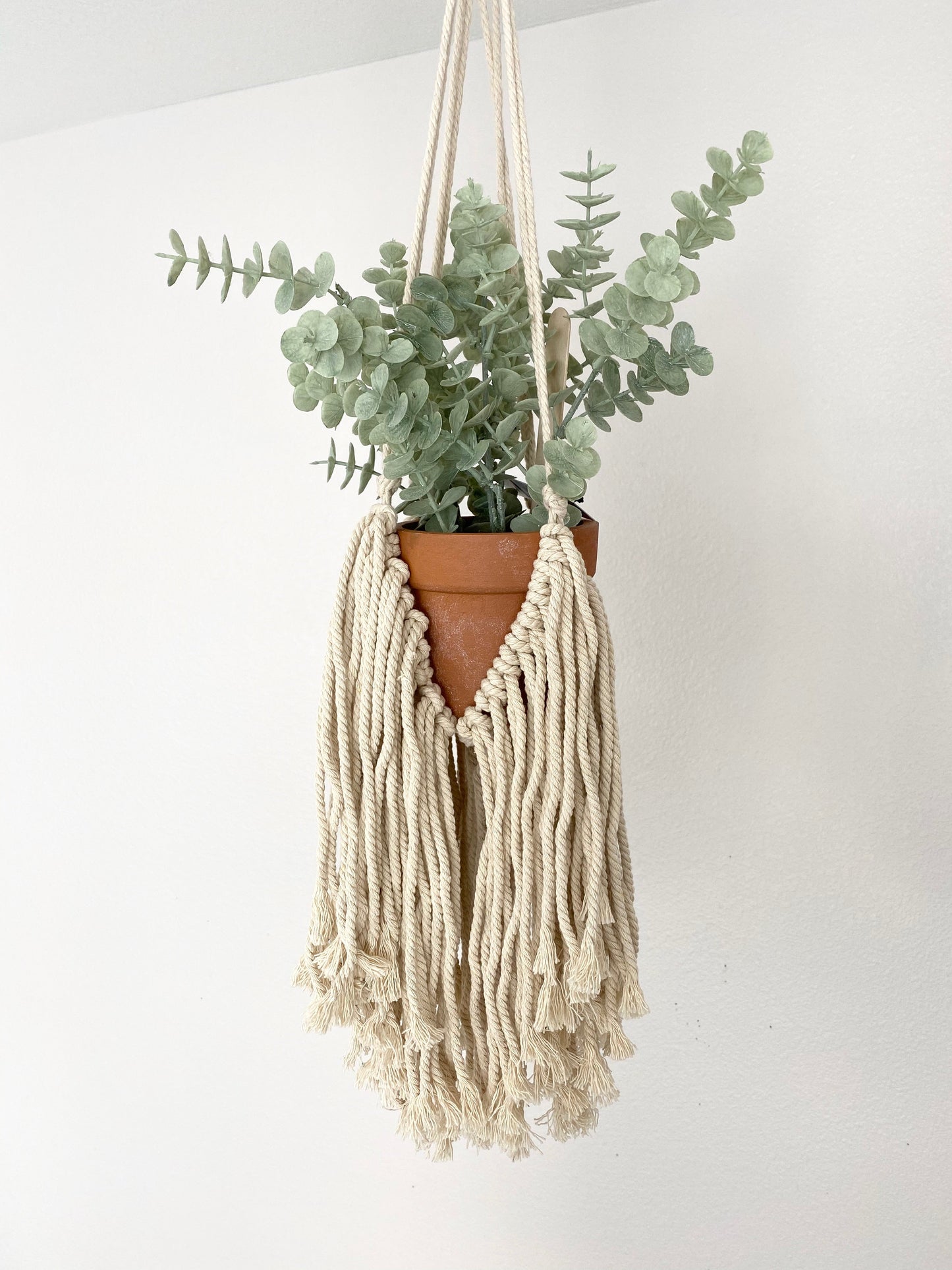 Close-up view of macrame knot work texture