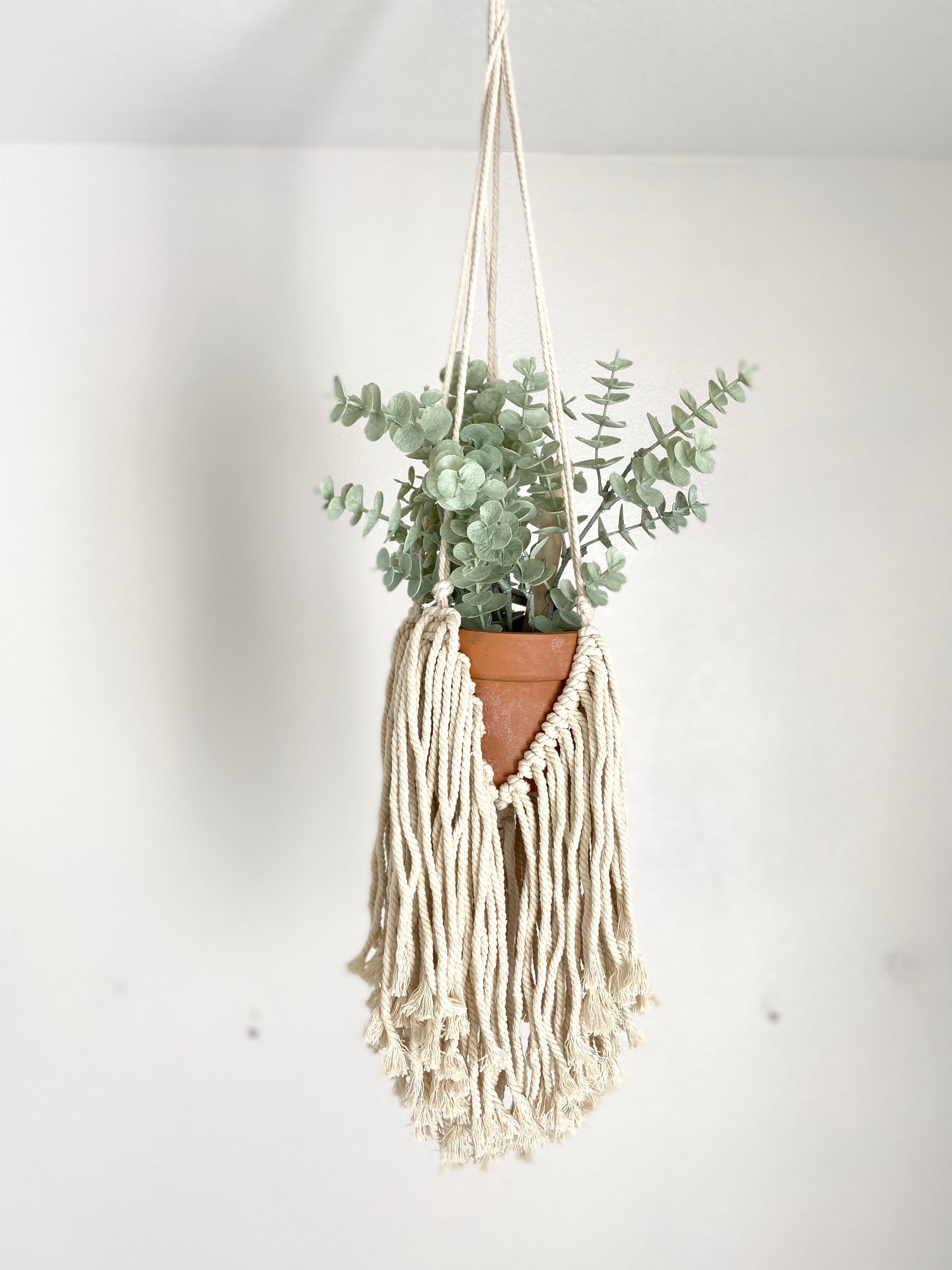 Handmade macrame hanger detail with knot pattern