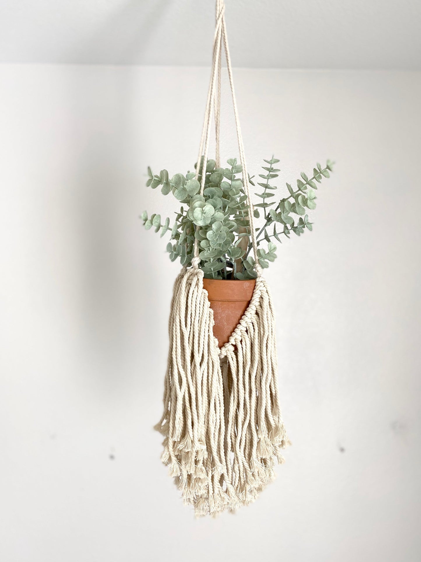 Handmade macrame hanger detail with knot pattern