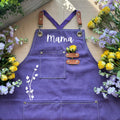 Women's gardening apron floral print utility vest worn for garden work