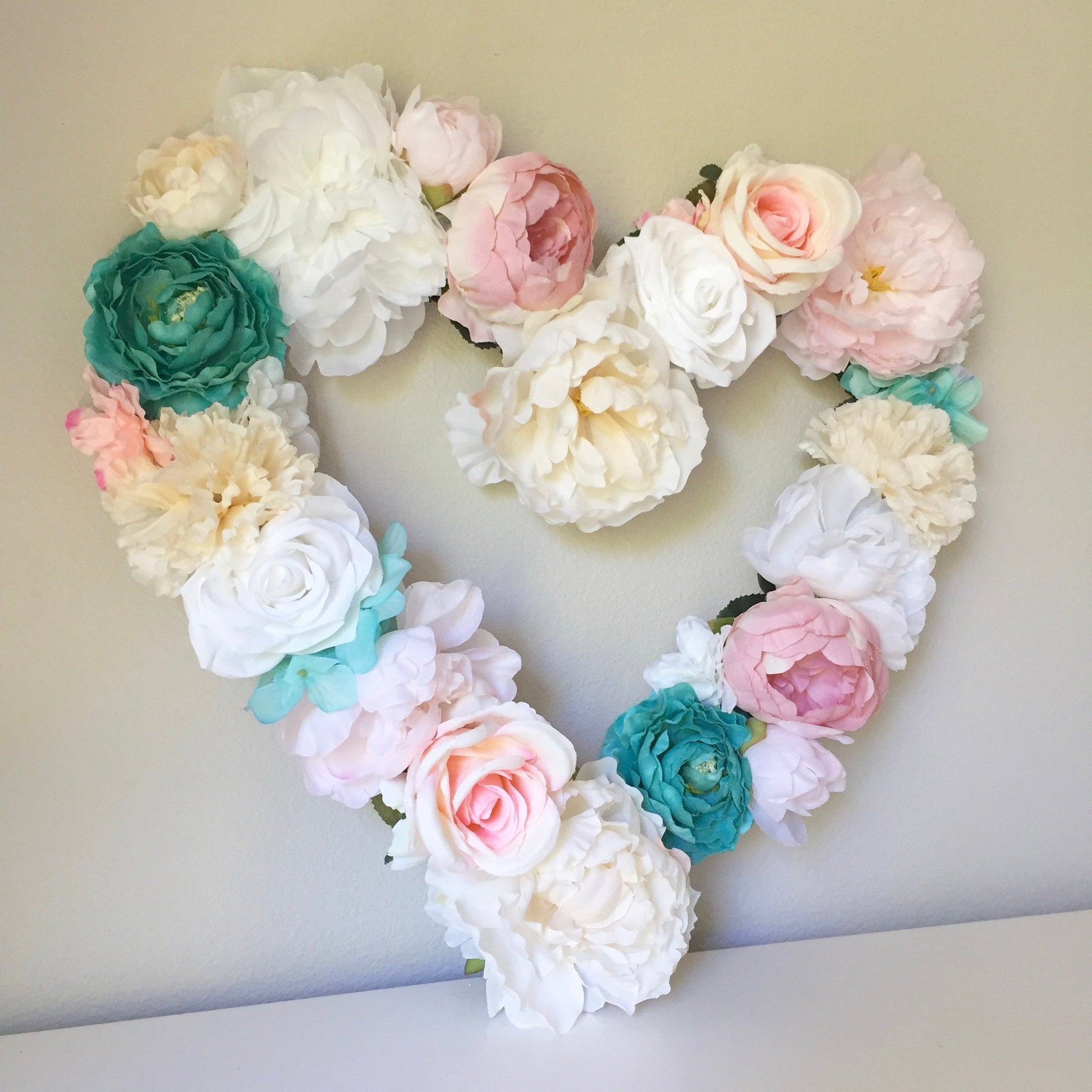 Floral heart wreath bridal shower backdrop
