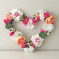 Heart shaped floral wall decor wedding sign