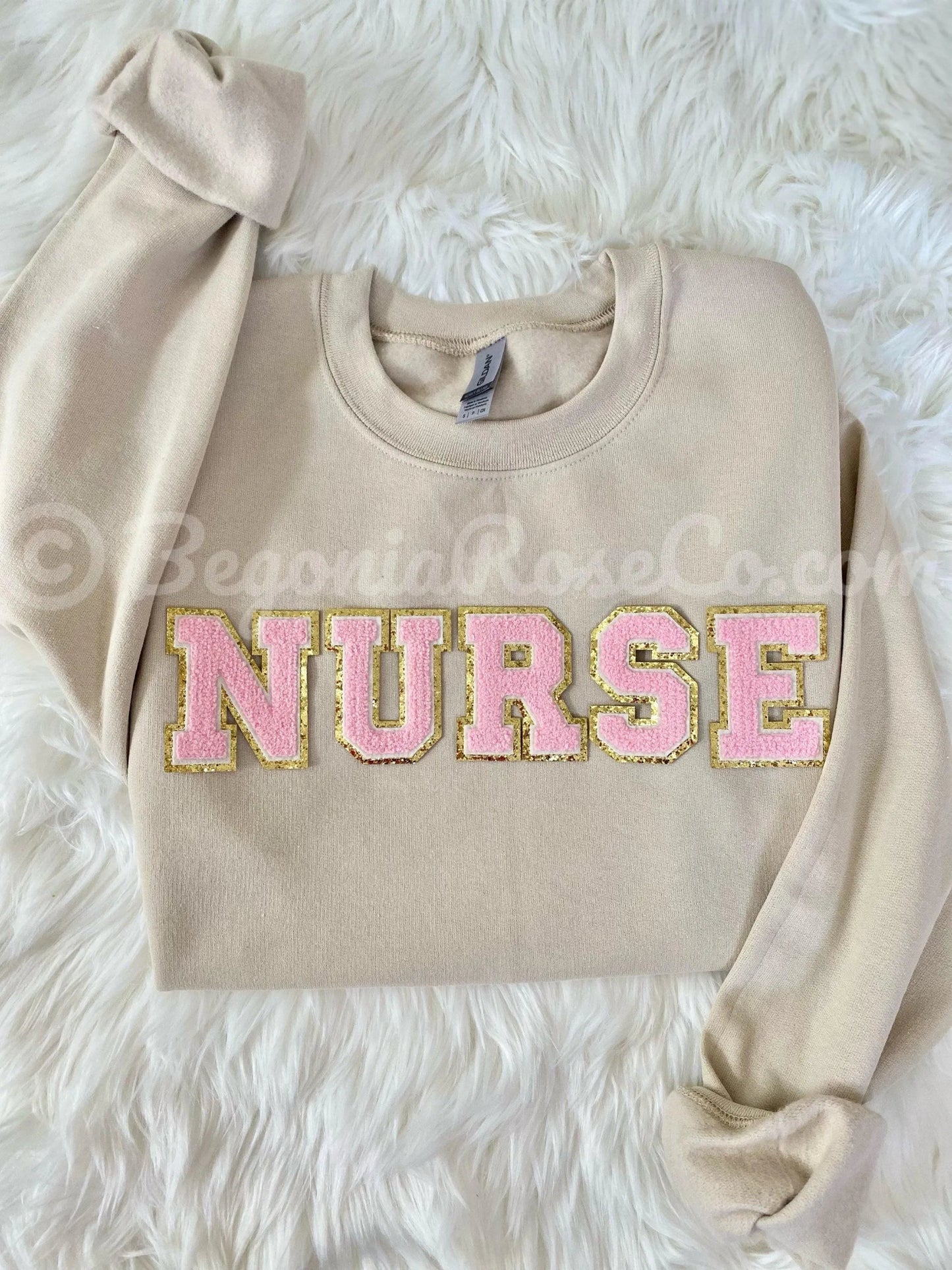 Chenille NURSE patch crewneck sweatshirt detail showing fluffy patch texture