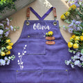 Gardening apron with pockets worn for floral arranging and garden work