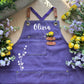 Gardening apron with pockets worn for floral arranging and garden work