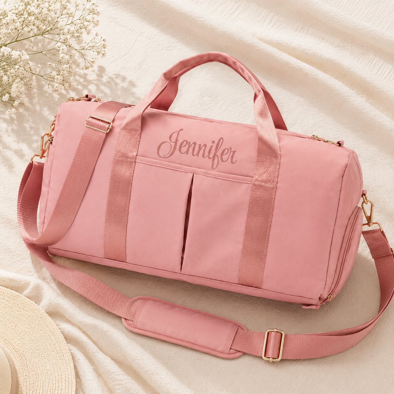 Pink personalized weekender duffel bag with Jennifer embroidered on front