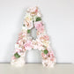 Floral initial flower letter wedding table centerpiece in faux flowers