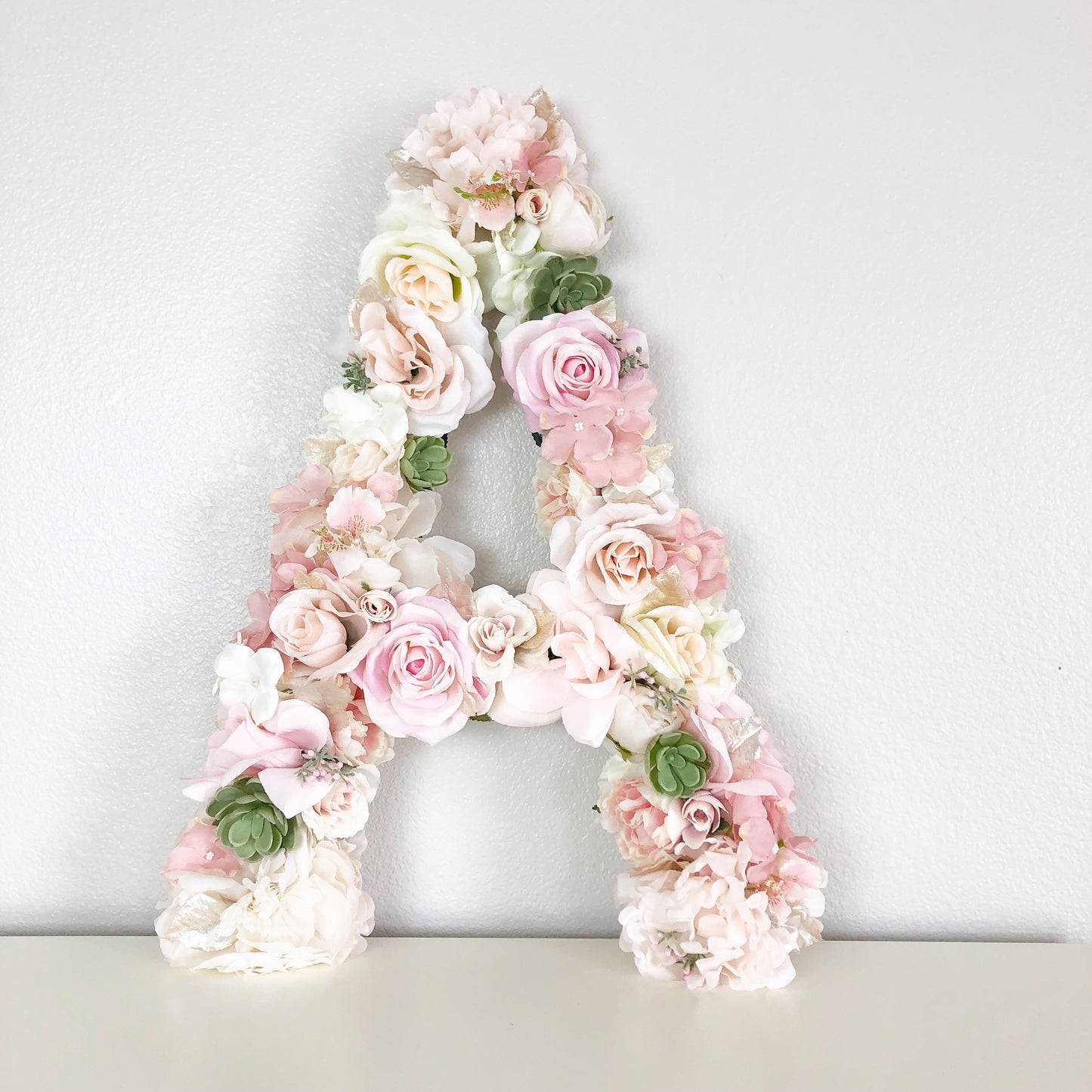 Floral initial flower letter wedding table centerpiece in faux flowers