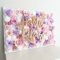 Flower wall name sign floral backdrop for birthday party and nursery