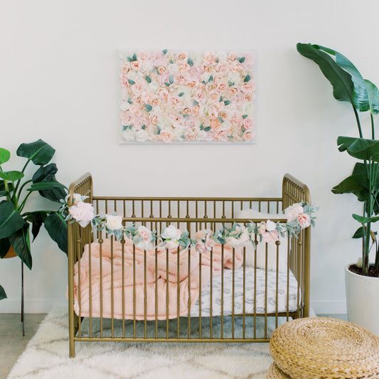 Floral nursery flower wall with name sign for boho baby shower decor