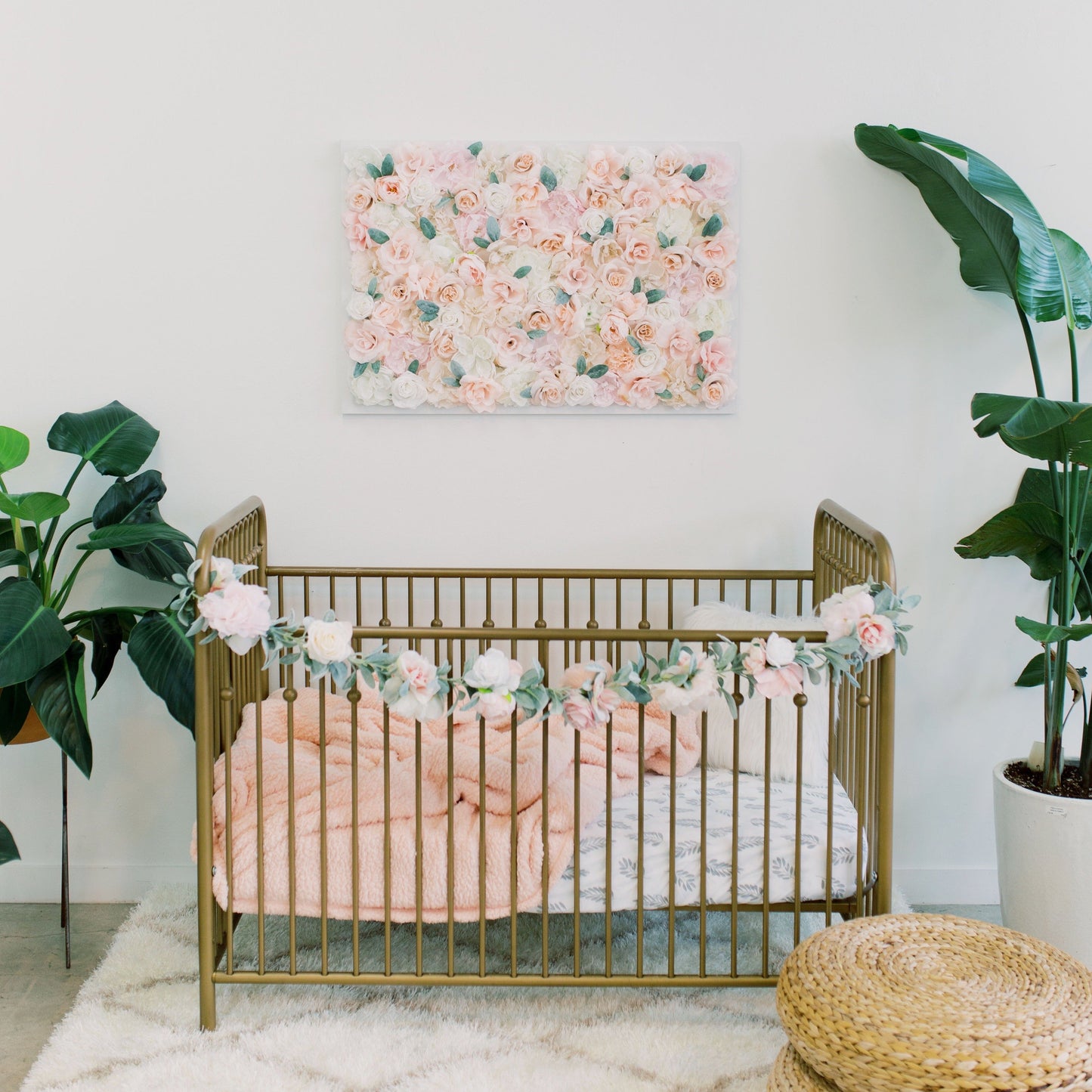 Floral nursery flower wall with name sign for boho baby shower decor