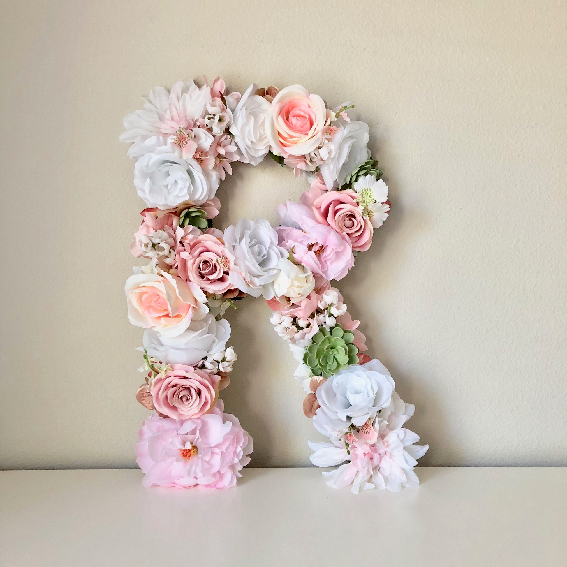 Floral letter rose gold name sign for nursery decor