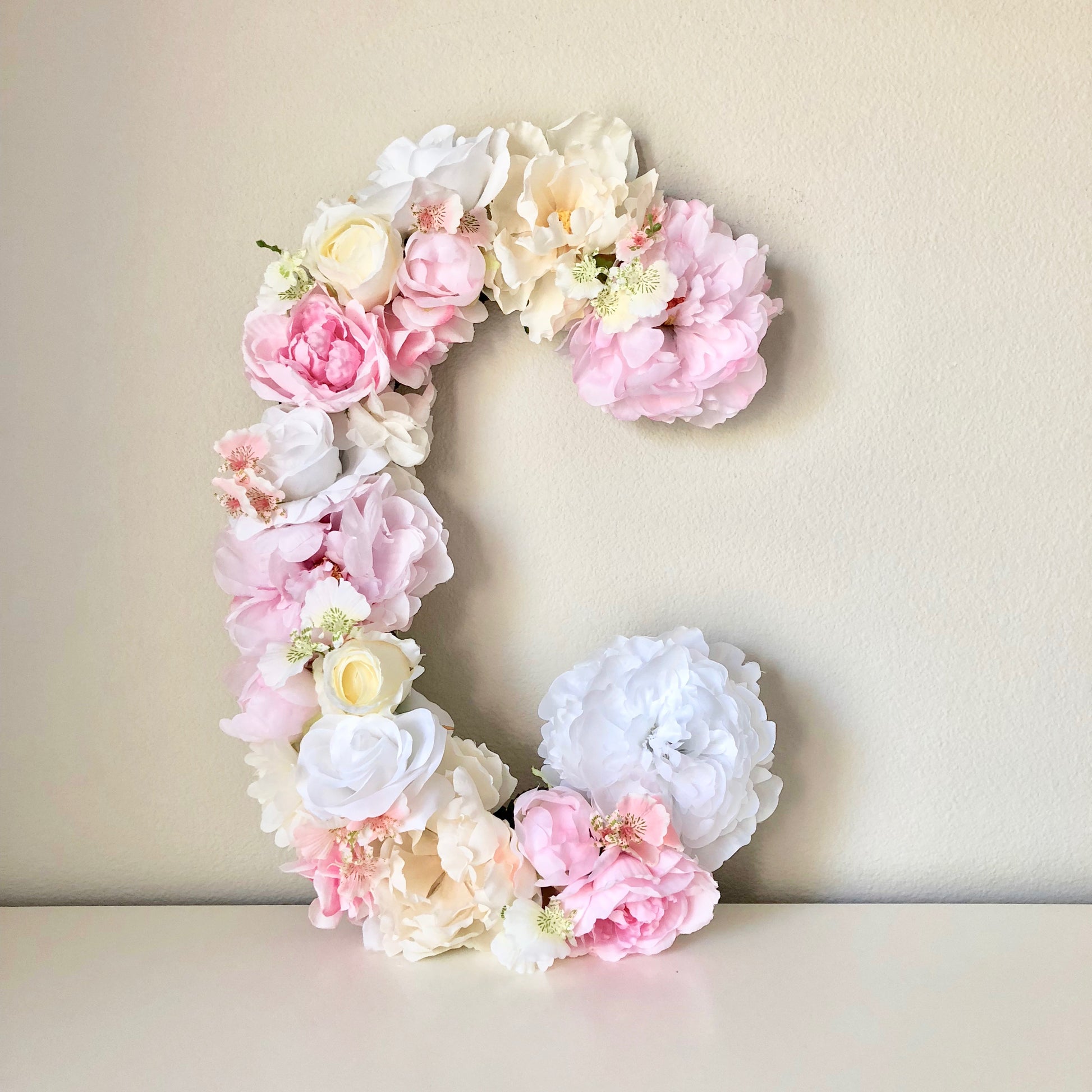 Floral letter blush baby name art for nursery wall decor
