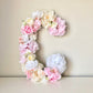 Floral letter blush baby name art for nursery wall decor