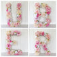 Floral letter event sign for company party and business decor