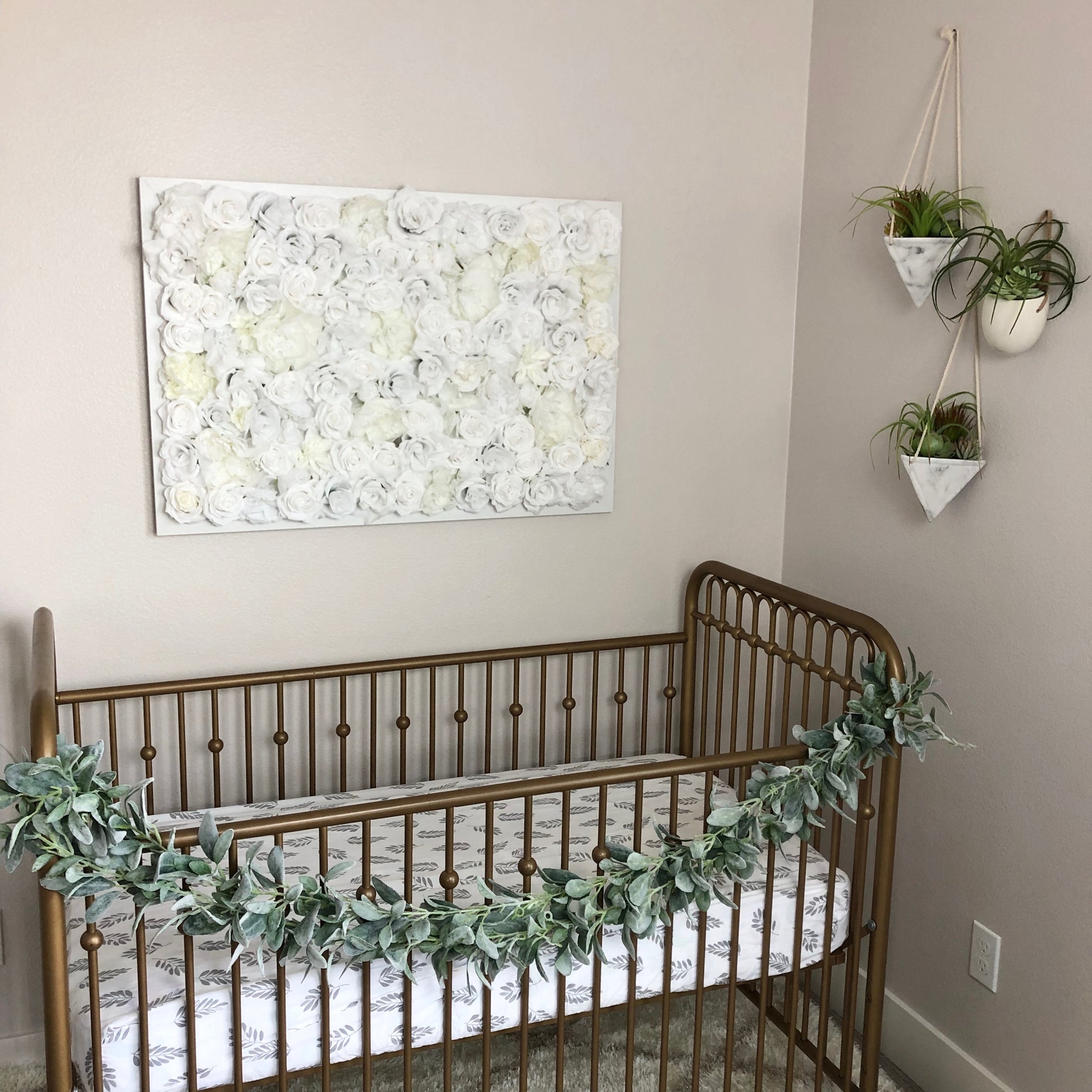 White silk flower wall statement piece for gender neutral nursery decor