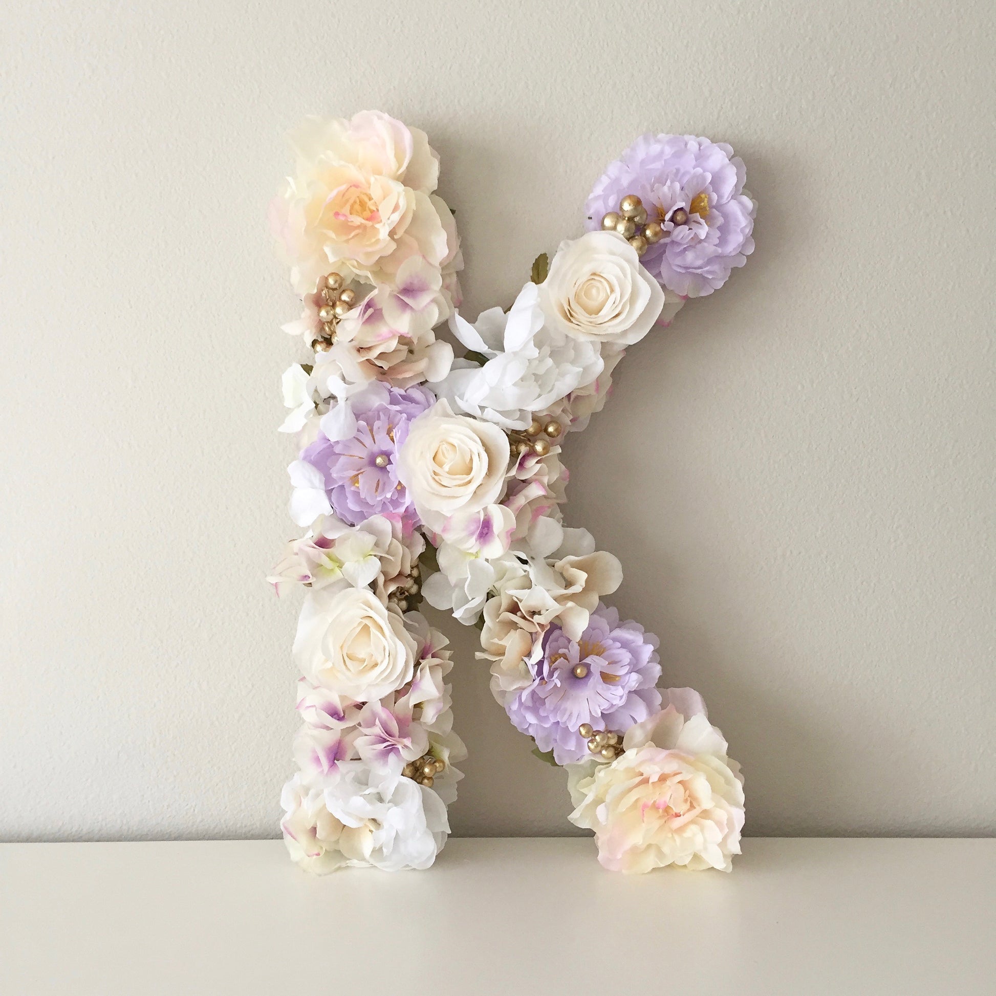 Floral letter lavender and gold decor for baby shower