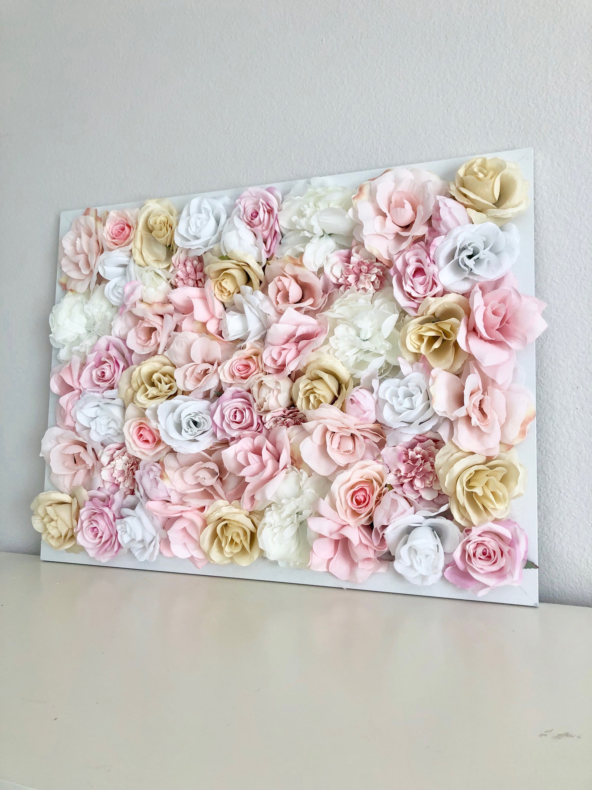 Blush and gold silk flower wall hanging for nursery and shower decor