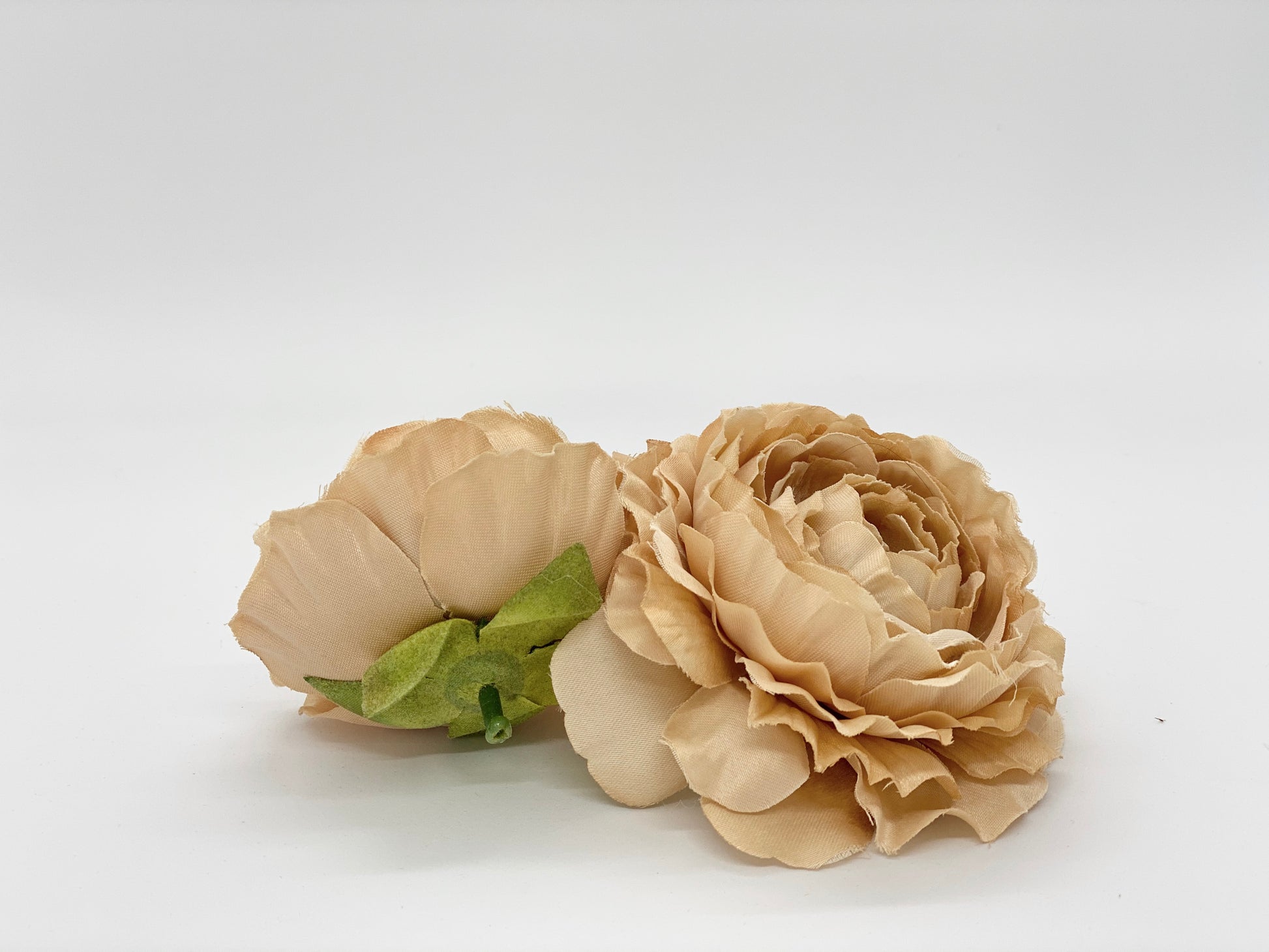 Tan silk ranunculus layered petals for neutral bouquet design