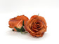 3.5-inch burnt orange artificial rose top view - terracotta faux silk flower close-up detail