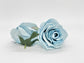 Dusty blue faux rose close-up petal detail - artificial silk flower