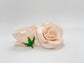 Nude blush artificial rose closeup for soft wedding arrangements